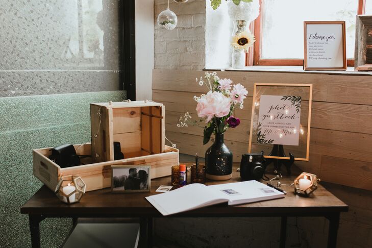 Wood Table with Guest Book and Romantic Decorations