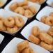 “What’s better than cake? Hot donuts,” says Mindy. Instead of a wedding cake, the couple served fresh, hot donuts to their guests and provided sweet toppings for them to add.
