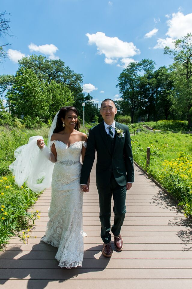 Marla wanted to look romantic but struggled to find the right dress. She tried on dozens of styles before finding this all-lace strapless Rosa Clara fit-and-flare gown. She had shoulder straps added to give it a twist.