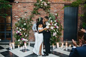 Bride, Groom and Wedding Arch at Altar