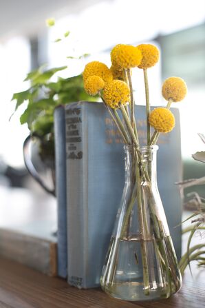 Eclectic Centerpieces With Blue Accents and Yellow Blossoms