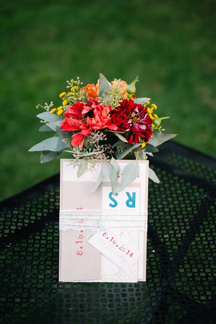 Beacon Hill designed the wedding invitations for Lisa and Andy's wedding day, each individually wrapped with a piece of lace trim and bakers twine.