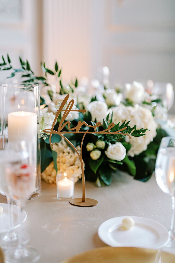 Gold, Calligraphy Table Number With a Low Centerpiece and Candles