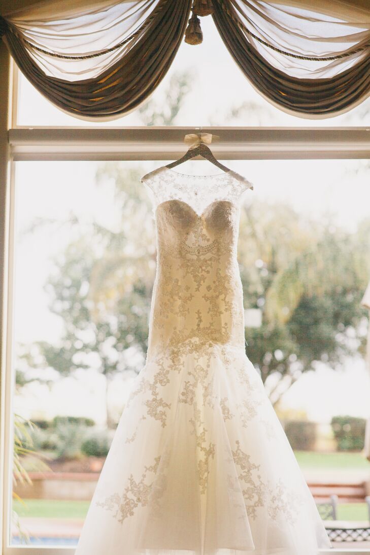 Although the Casablanca Bridal dress didn't initially catch Nadia's eye, she fell in love with the gown once she tried it on. The illusion neckline was paired with lace accents on the rest of the dress, which embodied a romantic style.