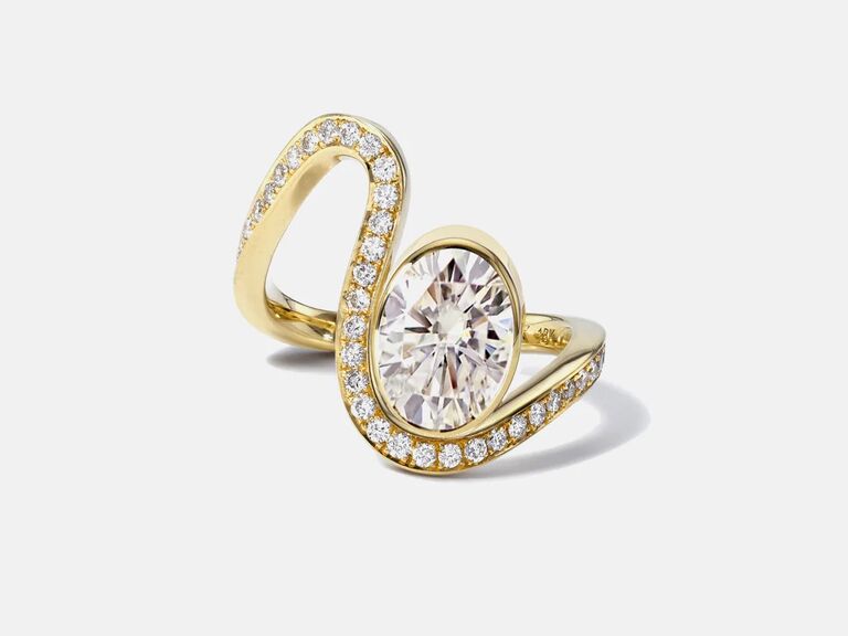 oval engagement fluid diamond-adorned gold band