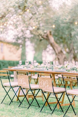 Mr. and Mrs. Signs on Bistro Chairs at Tuscan Wedding Reception