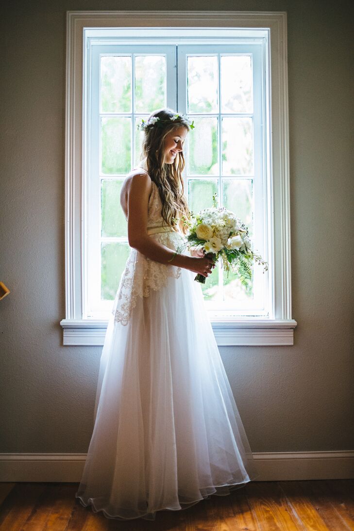 "I found the most perfect dress at a vintage boutique in New York City," says Brooke. "They made it using old vintage dresses, refashioning them into a modern style. The dress had leather straps that wrapped around my back and waste."