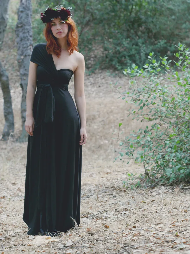 Asymmetrical bodice and full skirt with tie on waist