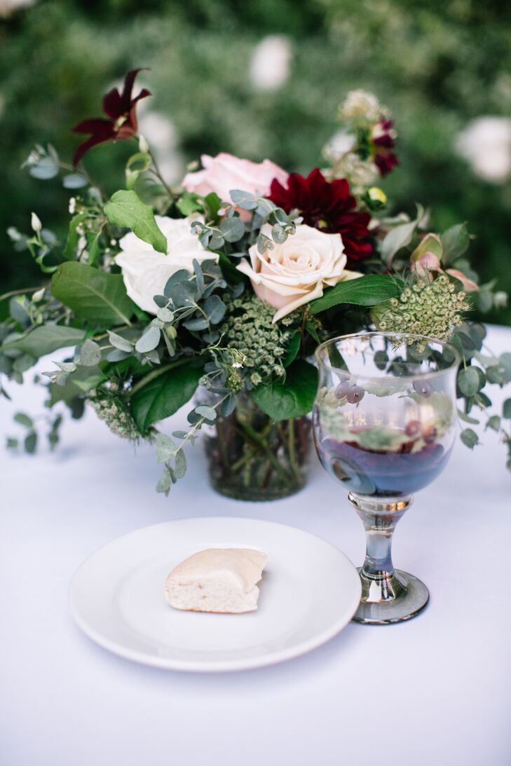 Natural greenery and soft blooms in shades of ivory, blush and merlot effortlessly complemented the surrounding space while creating a romantic ambiance at Franciscan Gardens in San Juan Capistrano, California.