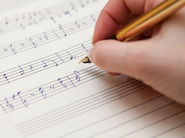 Person writing music, custom song gift for wife