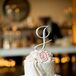 Two-Tier Cake with Fondant Draping and Flowers