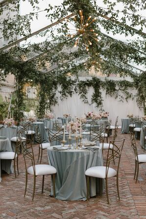 Small Round Tables With Blue Linens at Outdoor Reception, Hanging Greenery