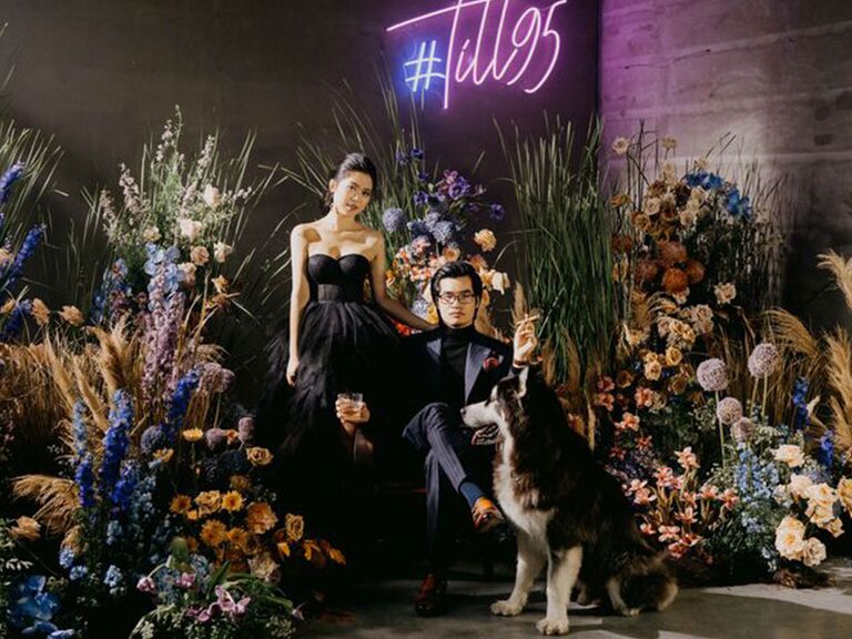 couple wearing black for wedding vow renewal