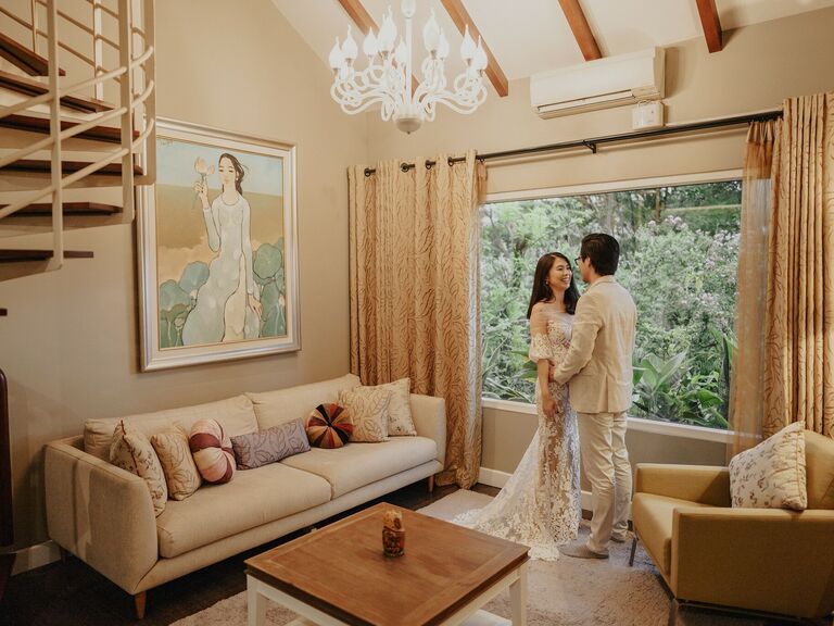 Couple gets ready for their wedding together. 