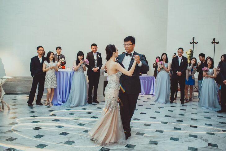 Dongli and Chengyuan took their first dance as a married couple in front of their guests inside Legion of Honor in San Francisco, California. Dongli changed into a champagne-colored dress accented in crystals for the reception.