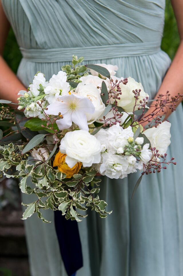 Marla's bridesmaids wore J.Crew dresses in the same color and fabric but in different figure-flattering styles.
