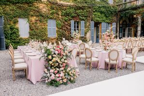 Long and Round Tables With Blush Linens, Floral Runners and Centerpieces in Historic Courtyard