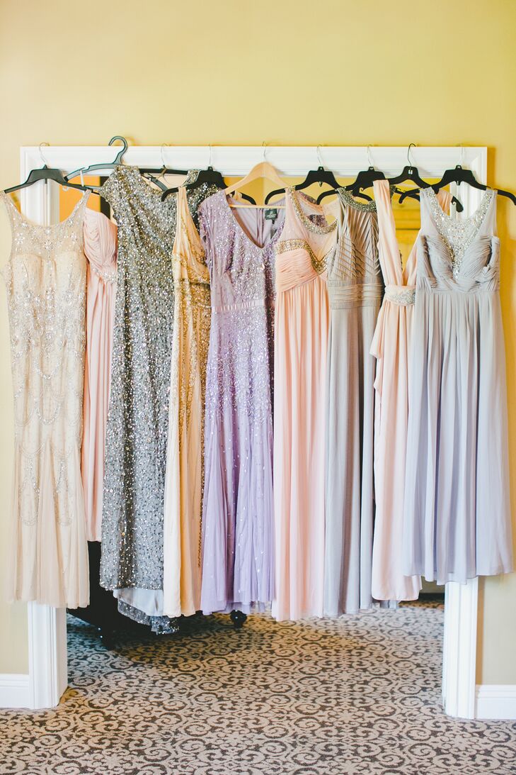 The bridesmaids picked different dresses in a variety of soft colors and lengths. The gowns went perfectly with the palette of whites, pinks and lavender.