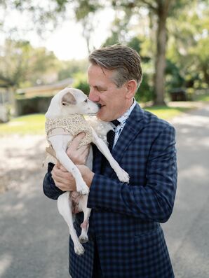 Groom in Plaid Suit Kissing Dog