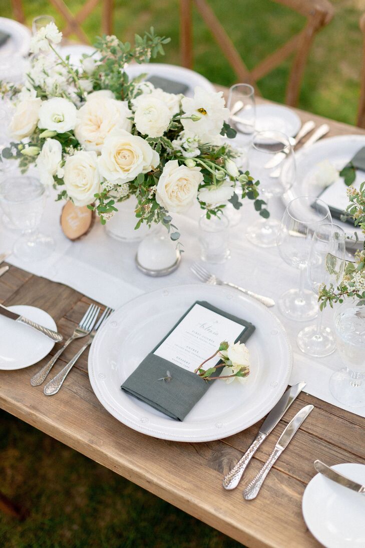 Rustic Place Setting With Gray Napkin on Wood Farm Table