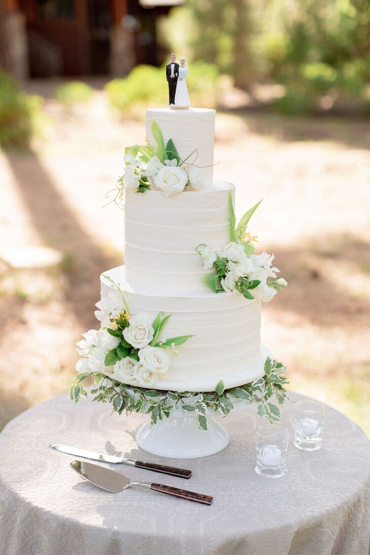 Two-Tier Wedding Cake Decorated With Sweet Pea and Lisianthus Blooms