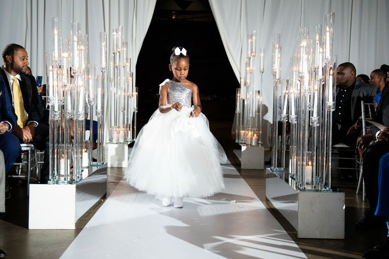 Flower girl in white-and-silver dress