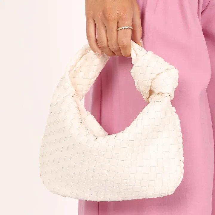 White woven handbag