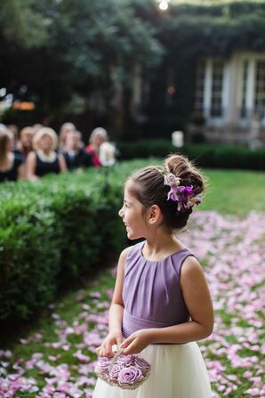 Flower Girl Carrying Spray Roses During Wedding Ceremony