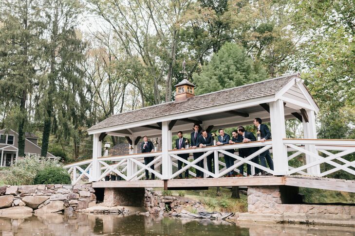 Groomsmen Donning Classic Suits and Purple Ties