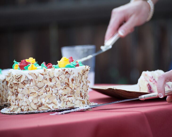 Sharon and Eric enjoyed a two-layer yellow butter cake filled with German wine custard and raspberry filling. It was cover in marzipan and vanilla buttercream icing and toasted almonds.