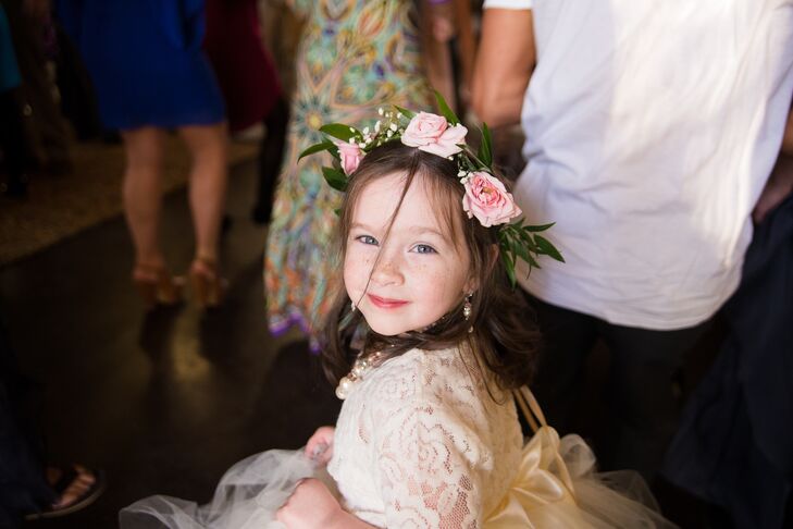 The flower girls wore ivory tutu dresses made by Tricia's friends. "They were adorable and the blush pink flower halos made it even more precious," says Tricia.