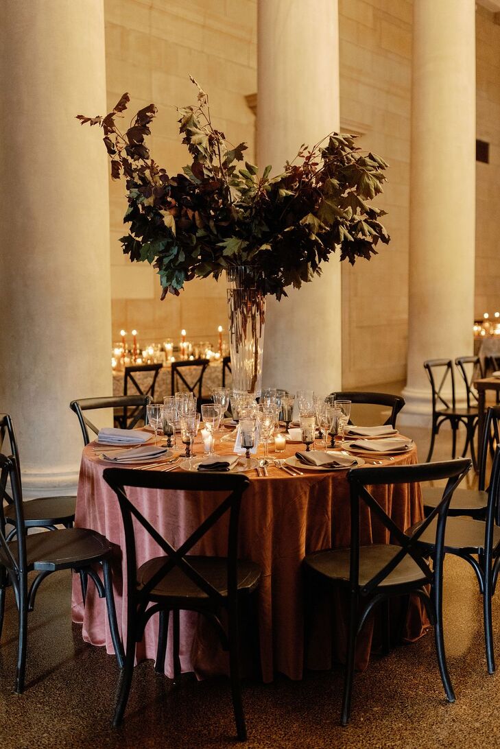 Round Reception Table in Museum With Pink Linens, Towering Centerpiece