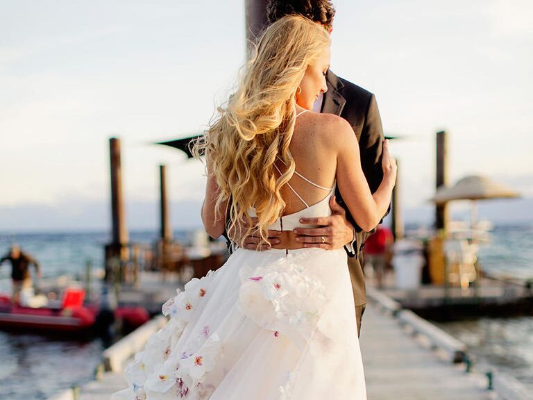 wedding dress designer Hayley Paige in a crop top wedding dress with floral applique 