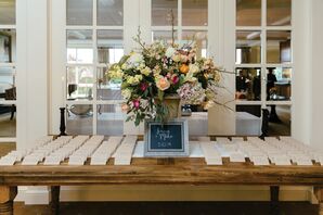 Lush Escort Card Display with Chalkboard Sign