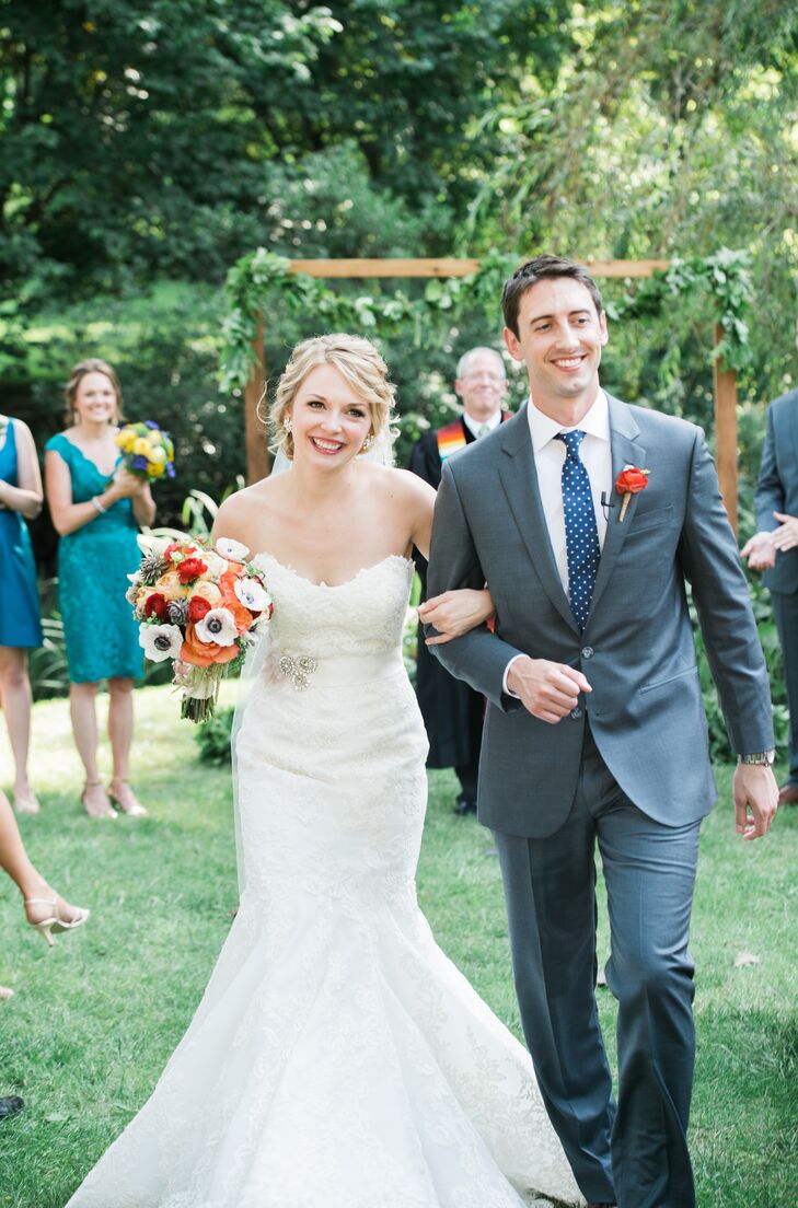 Married Couple Walking From Ceremony