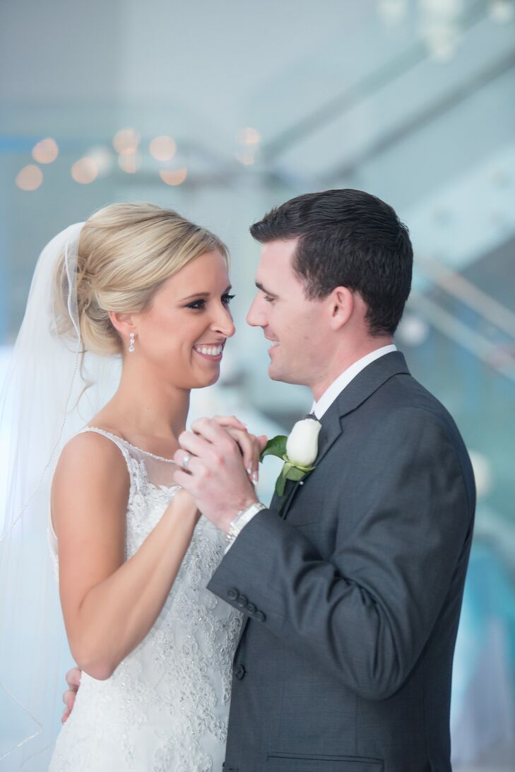 Brianna kept her makeup light and natural with added drama around her eyes. She styled her hair in a romantic updo to show off the plunging back of her gorgeous wedding dress.