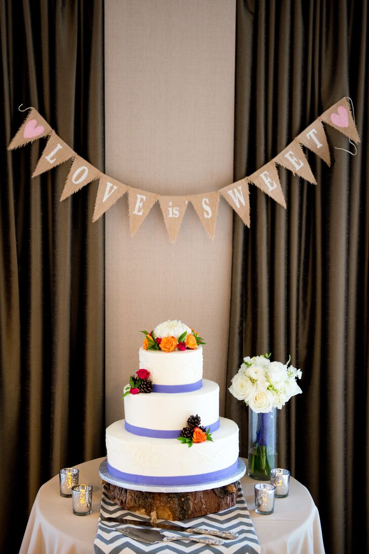“Our wedding cake was prepared by Shamane’s Cakes,” Michelle says. “The top two tiers were coconut cream and the bottom layer was a light berry-citrus mix. We can attest that both layers were delicious, as we consumed the leftovers at the end of the reception in our room.”