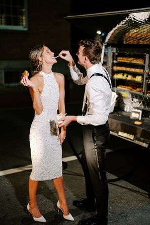 Groom Feeding Bride Snacks in Late-Night Midi Dress With Embellishments