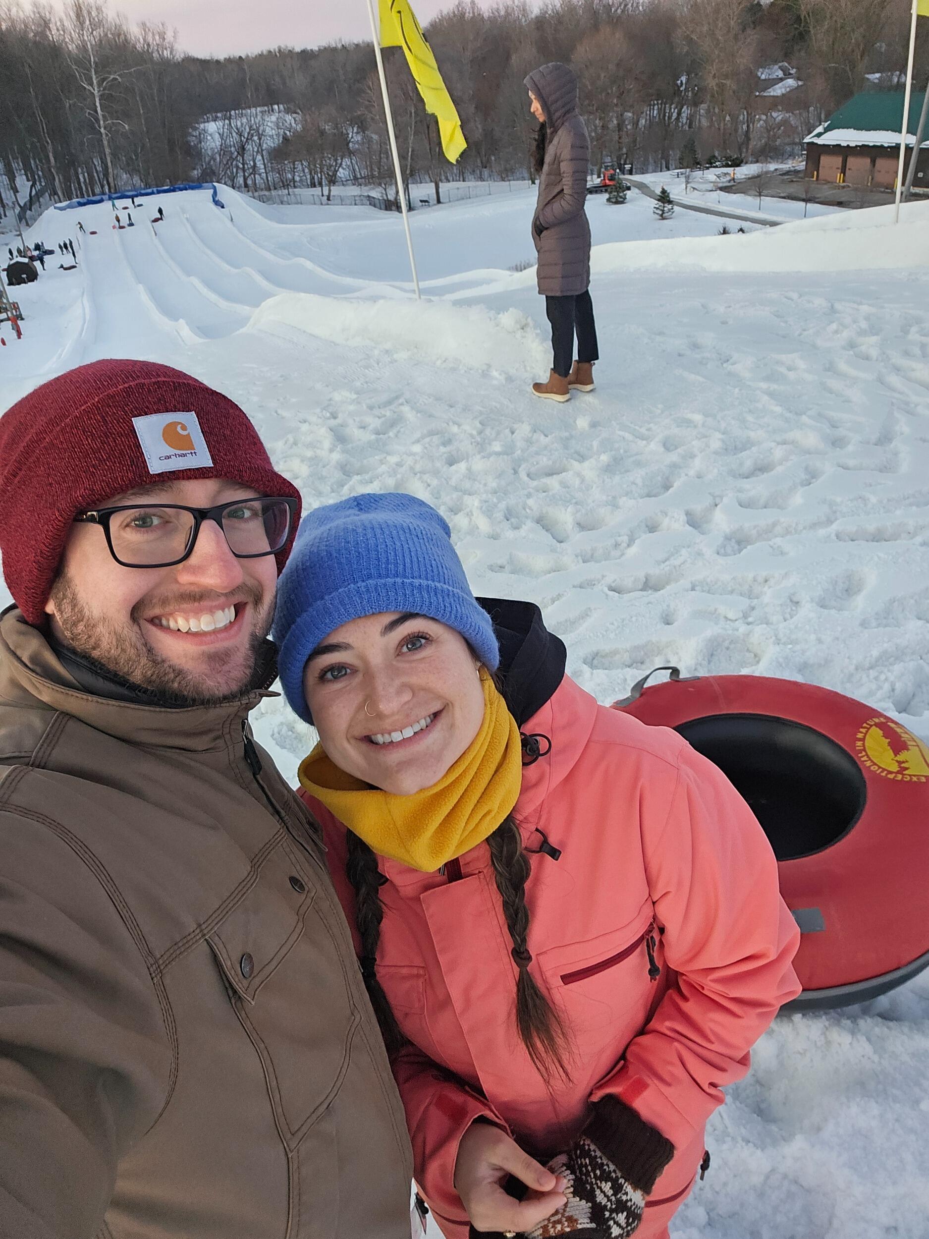 Our first time sledding together - at Hawk Island, MI.