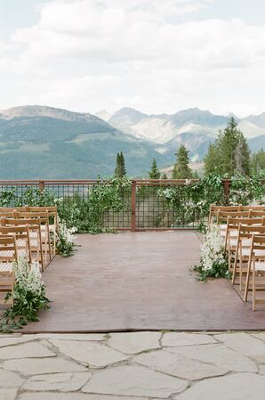 Ceremony Site with Mountain Views and Folding Chairs at The 10th in Vail, Colorado