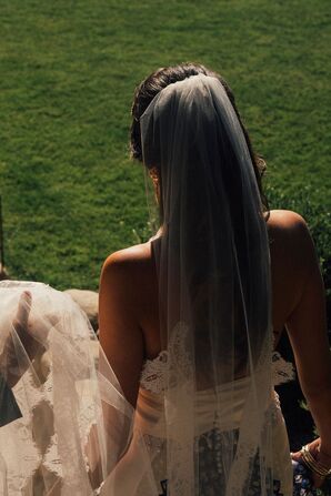 Bride From Behind, Long Bespoke Veil, Lace, Hair in Ponytail Before Alternative Wedding