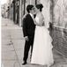 Jessi found her strapless organza gown on her very first shopping excursion, to David's Bridal. The gown had three satin bands at the waist and a satin-edged apron back. Her mother made the soft organza veil with satin trim.