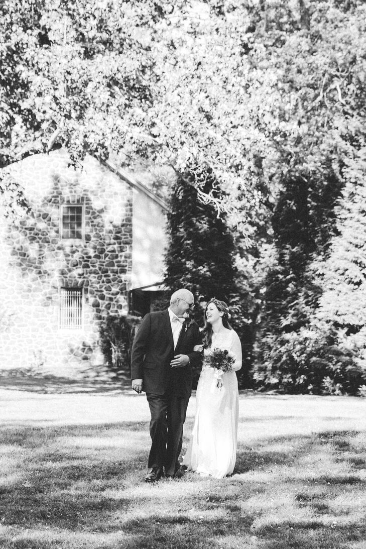 Lauren and Paul are close to their families and wanted nothing more than to include them in the wedding at Anthony Wayne House in Paoli, Pennsylvania. Their family members helped with the decor and took part in a community ceremony, and Lauren’s father even walked her down their grass aisle. "Sea of Love" by Cat Power played in the  background as they entered the custom ceremony.