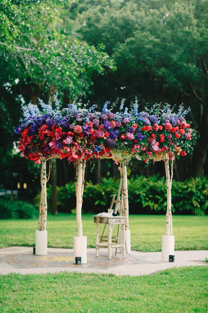 Colorful blue-and-purple floral chuppah