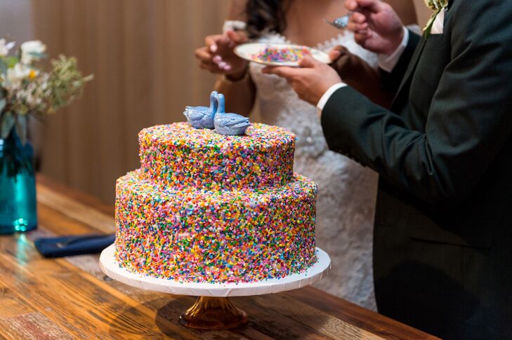 Marla and Trevin had two small cakes: a simple ivory buttercream cake and another covered in colorful sprinkles.