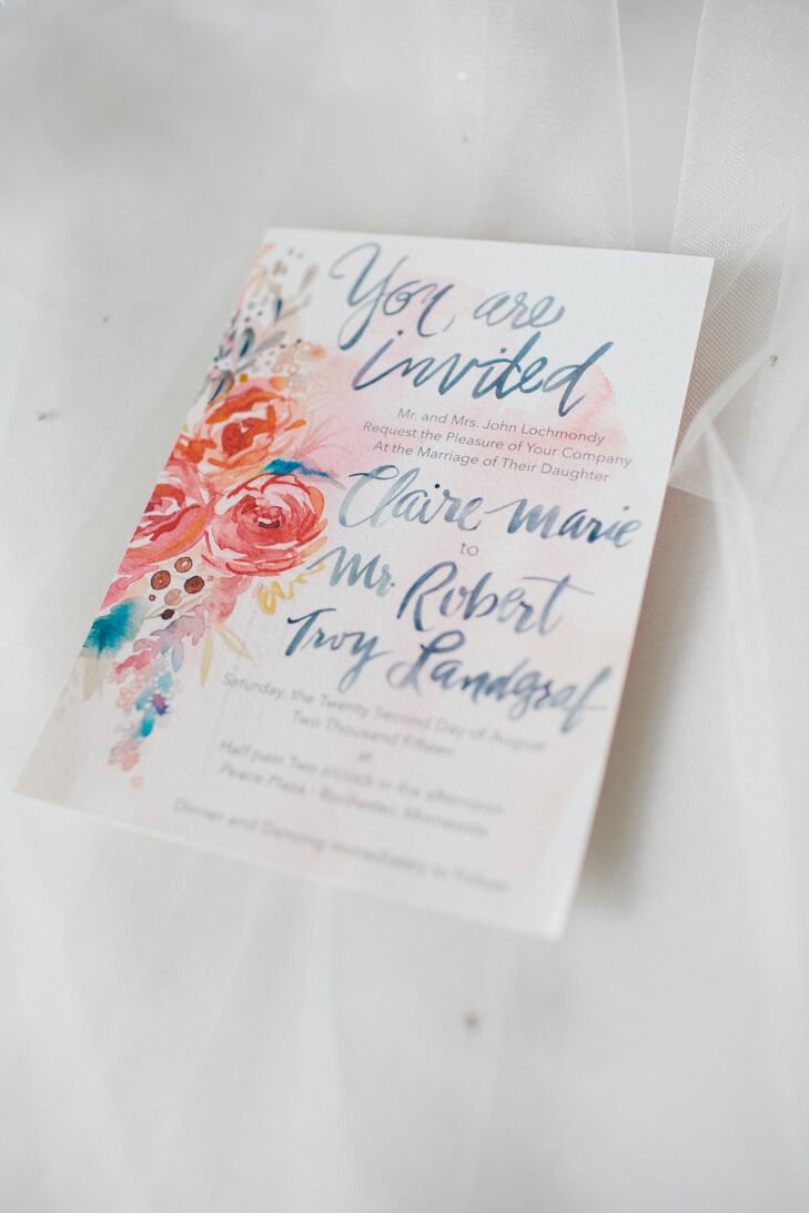 Claire and Rob wanted their invitations to be as special as their wedding. After searching high and low for the perfect look, Claire met Amarilys Henderson, owner of Watercolorful Wedding. She created a beautiful invitation complete with the couple's names and flowers watercolored on the front as well as one of her watercolor prints on the back.