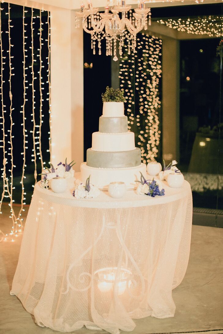 Miriam and Bassel's cake alternated between classic white and metallic silver.