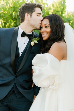 Bride With Puff Sleeve Wedding Dress and Groom in Tux at HammerSky Vineyards in Paso Robles, California