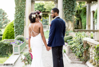 tight curls with floral headpiece
