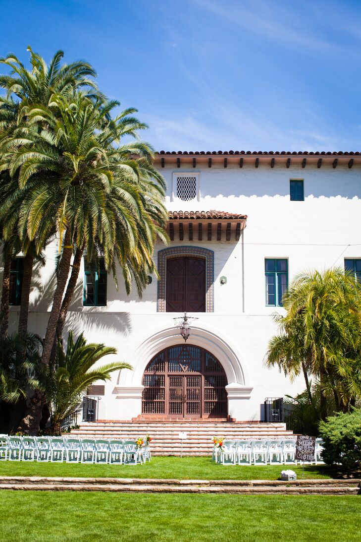 The couple said "I do" in the sunken garden of the Santa Barbara County Courthouse. Guests looked on from simple, white chairs while Sarah and Joshua sealed the deal under a pair of palm trees.